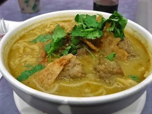 coconut-chicken curry with wilted spinach